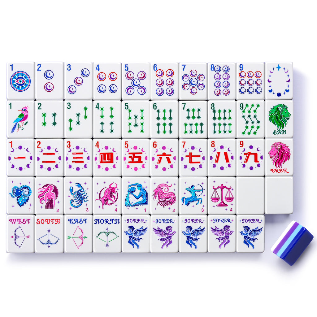 Lunara Celestial American mahjong tiles laid out on white, with navy, light-blue and purple layered backs