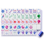 Lunara Celestial American mahjong tiles laid out on white, with navy, light-blue and purple layered backs