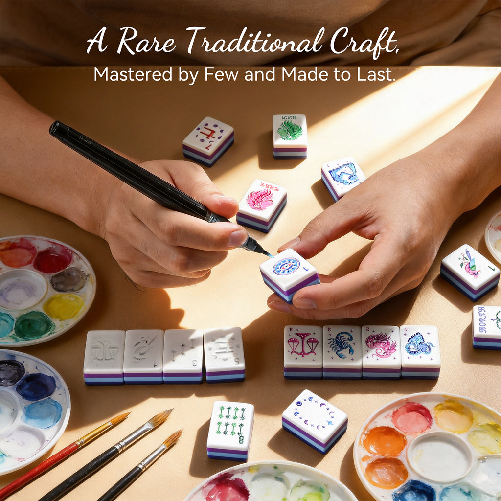 Lunara tiles being color-finished by hand, with paint palettes and brushes