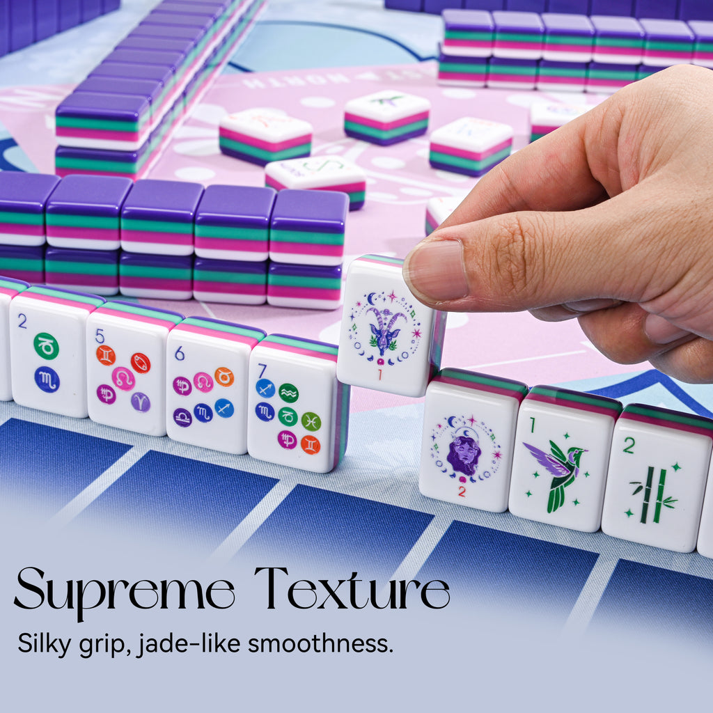 Hand placing a Velora Zodiac Flower tile, close-up of the smooth acrylic finish