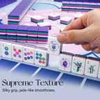 Hand placing a Velora Zodiac Flower tile, close-up of the smooth acrylic finish